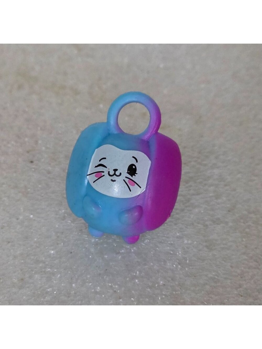 Moose Enterprise Pikmi Pops surprise toy charm Blue & Purple White kitty face 1"